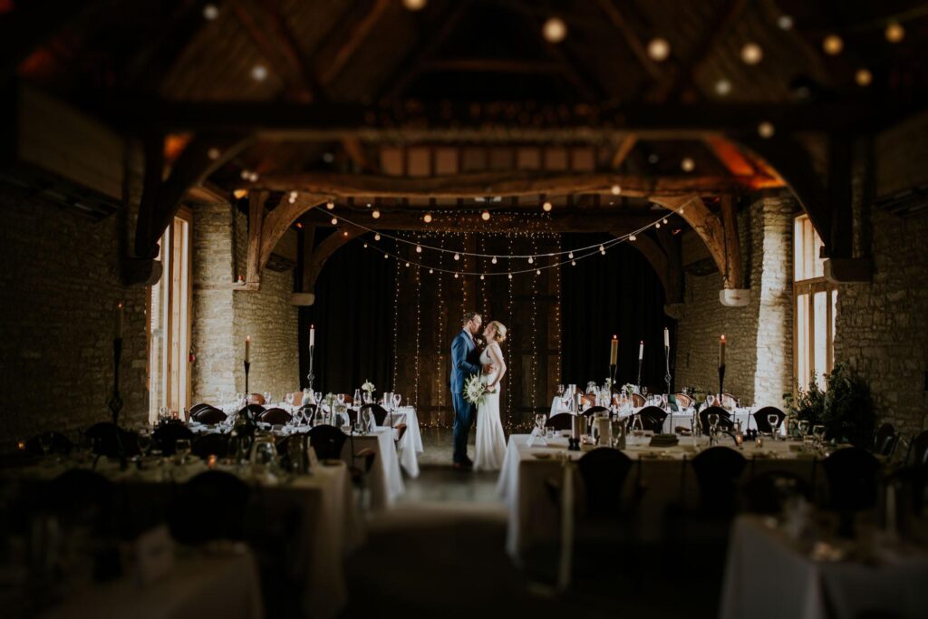 birde and groom portrait in the tythe barn launton